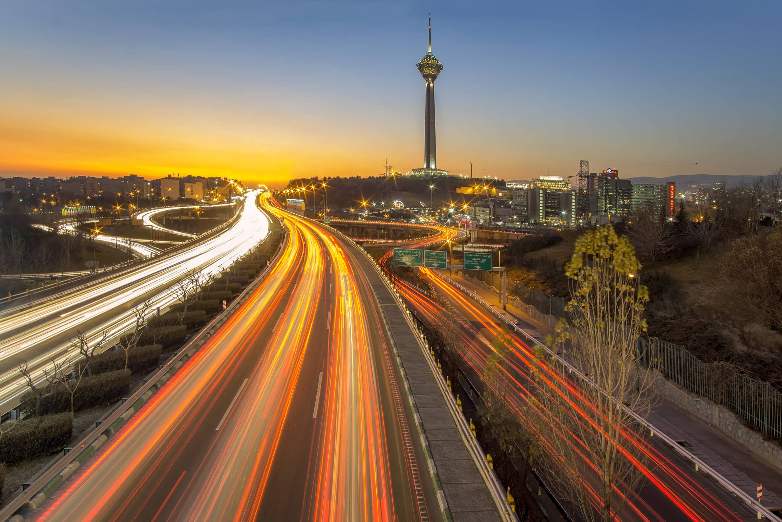 Skyline of Tehran at sunset Tar surfacing in Gauteng